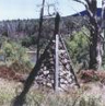 NSW-Victoria border cairn at the Snowy River. (Photo: Tony McLeod). Click to go to State and Territory Borders page.