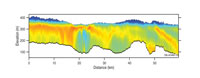 Figure 3. An example of a Geoscience Australia layered earth inversion (LEI), for an area near the Woolner Granite, showing resistive Cretaceous cover and a strong, easterly-dipping conductive unit in the far right of the image. Cool colours indicate resistors while warm colours indicate conductors. 
