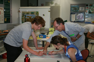 Fig 3. Visiting students gain a hands-on experience in the interpretation of geological maps during a National Youth Science Forum program visit to Geoscience Australia.