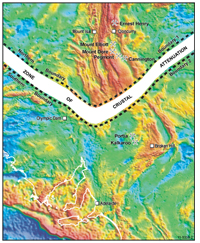 Fig 2b.   Reconstruction using the gravity image of the Mt Isa Province and the Broken Hill Block, and the co-joined Curnamona Province and Gawler Craton. Boundary 1 and Boundary 2 have been repositioned (with no rotation) to show a proposed reconstruction of the architecture during the Mesoproterozoic (the white area between Boundary 1 and Boundary 2 represents crust that was attenuated). The locations of major towns are shown as white squares and the mine symbol denotes mines.