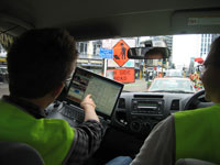 A field crew gathering urban landscape data with the Rapid Inventory Collection System (RICS). Copyright Geoscience Australia.