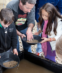 Fig 2. The sapphire sieving demonstration proved popular with visitors to Open Day.