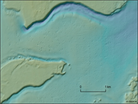 Fig 4. High resolution multibeam sonar image of the seafloor on the outer continental shelf of Joseph Bonaparte Gulf showing pockmarks formed in muddy sands across a valley floor.