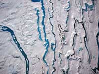 Overall winner of 2011 Top GeoShot photo competition &ndash; Meltstreams on the Lambert Glacier, Antarctica. Photographer: Ryan Ruddick.