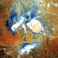 Fig 1. The scary face of Lake Eyre. Captured on 6th May 2006, in this Landsat image Lake Eyre appears as a scary face. The image won fifth place in the Earth as Art competition held by USGS in July 2012.