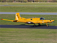 Photograph of an aircraft on a runway.