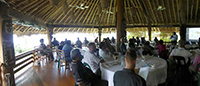 Figure 3: This figure is a photograph from the workshop Using Science to Support Decision Makers, co-led by the Government of PNG and Geoscience Australia, held on 9 August 2013. The photograph shows participants from across PNG listening to a presentation as part of the workshop. Photo Courtesy of Victoria Miller of Geoscience Australia.