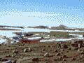 Thumbnail Mawson Station Panorama_2 with coloured buildings in the Antarctic 2003 - Geodesy - linked image 46k