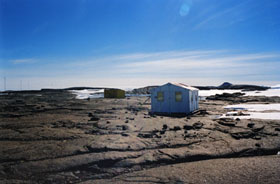 Fig 2. The absolute hut (foreground) and the variometer hut installed in 1985.