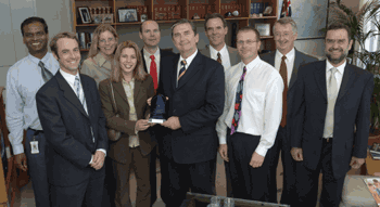 Geoscience Australia staff with Minister for Justice and Customs, Senator The Hon Chris Ellison. &copy; Geoscience Australia.