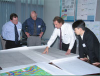 Alexey Goncharov, Geoscience Australia scientist with conference delegates.