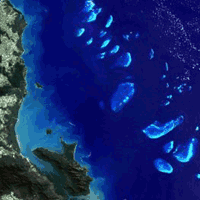 Hinchinbrook Island and Great Barrier Reef, Queensland - Landsat 7 ETM+ image 1999. &copy; Geoscience Australia.
