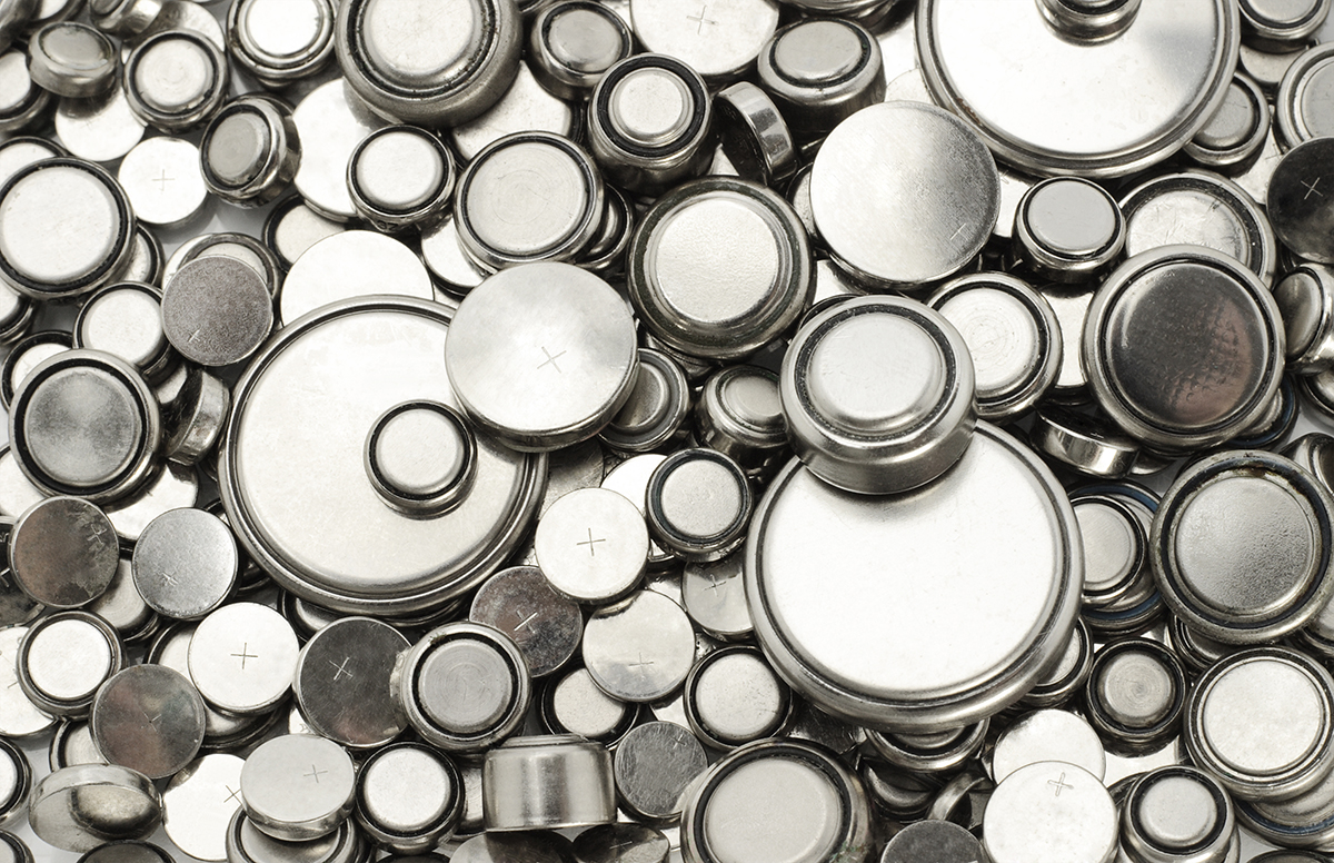 Image showing an assortment of circular lithium batteries of different sizes.