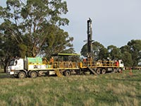 A stratigraphic drilling truck in operation
