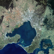 Composite satellite image of Greater Melbourne, showing Ballarat and Geelong in the west and Pakenham and Phillip Island to the east.