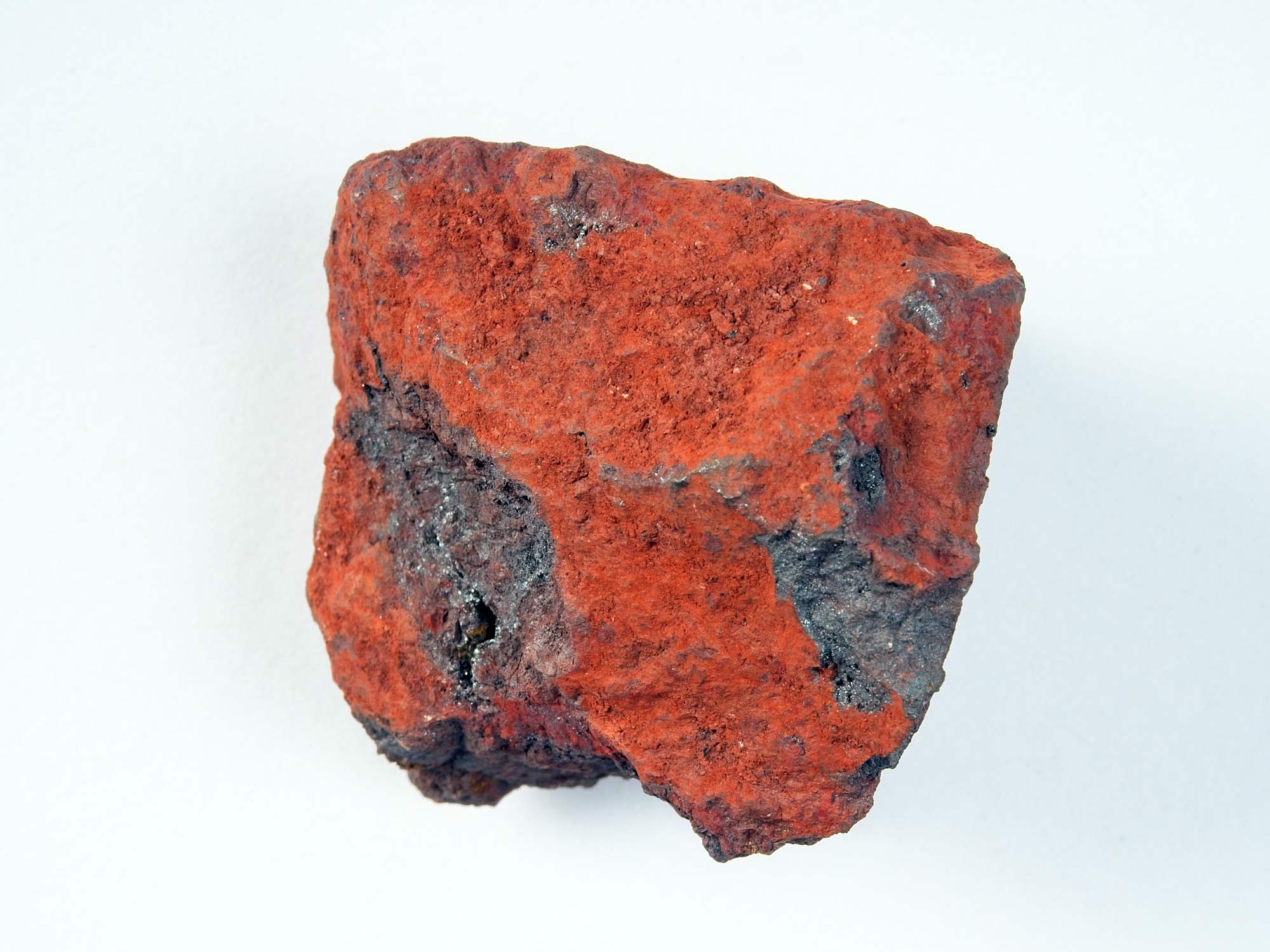 Orange coloured rock – Hematite ore.