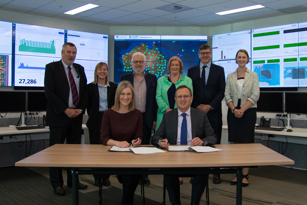 Land Information New Zealand Chief Executive, Ms Gaye Searancke, and Geoscience Australia’s CEO Dr James Johnson signing an agreement to continue our productive working relationship on mutual interests in geoscience.