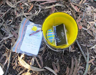 Another example of a geocache. Geocache contains miscellaneous items.