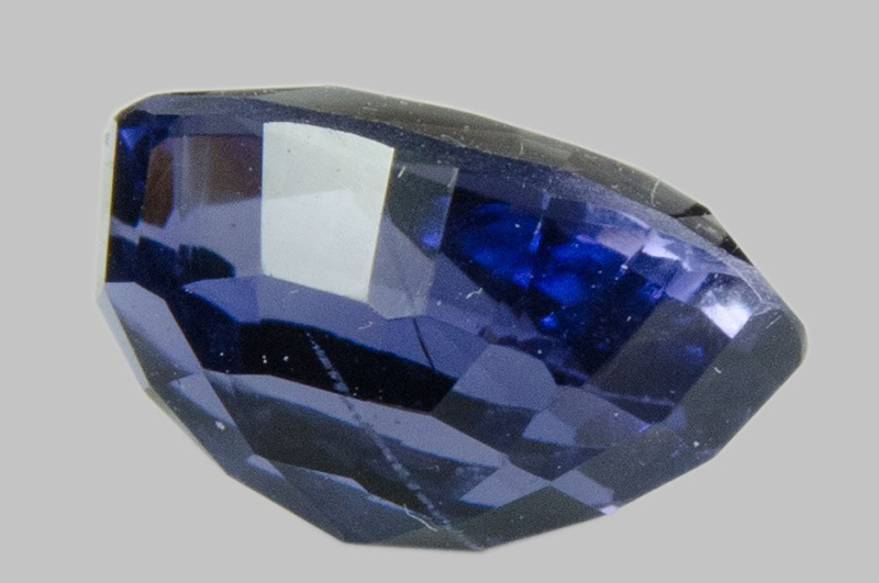 Shiny blue, faceted sapphire gemstone