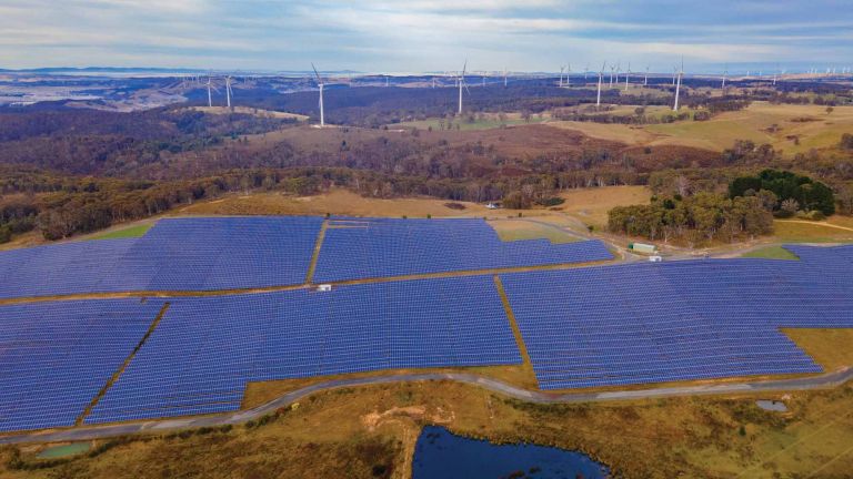 Aerial drone view of the hybrid Gullen Solar Farm and Gullen Range Wind Farm for renewable clean energy supply located at Bannister in the Upper Lachlan Shire, NSW, Australia