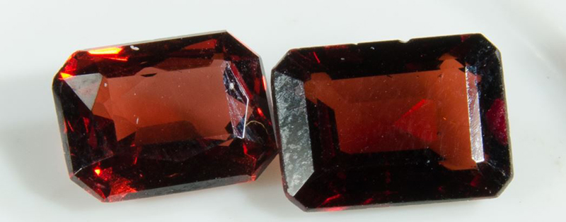 Two shiny, red crystals cut into rectangular shapes