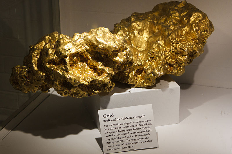 Large golden nugget on a pedestal