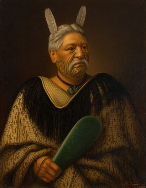 A painting of a maori chief with a tattoos on his face and feathers in his hair. He is holding a green coloured jade paddle in his hand.