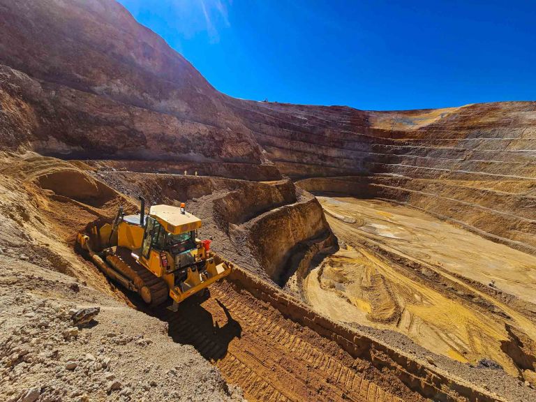 Mining machinery working in an open pit mine.