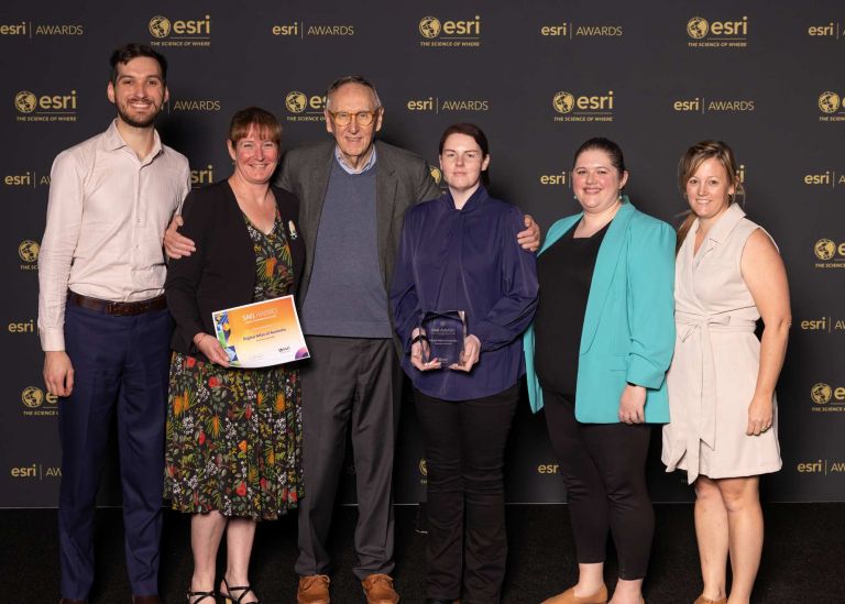 Maree Wilson and Megan McCabe with an award