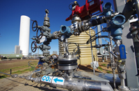 Various types of machinery and pipes that make up a CO2 injection well.