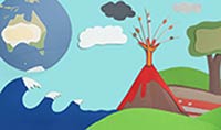A paper diorama including representation of a tsunami wave, the planet Earth, an erupting volcano and a geological cross-section.