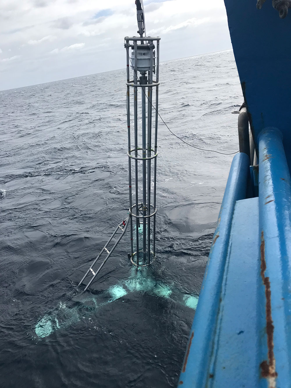 The vibrocoring system being deployed in the ocean