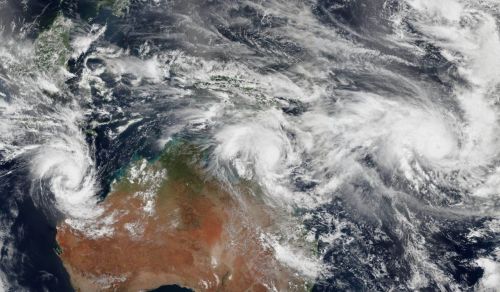 Satellite photo of the Australian continent with a cyclone moving across Queensland