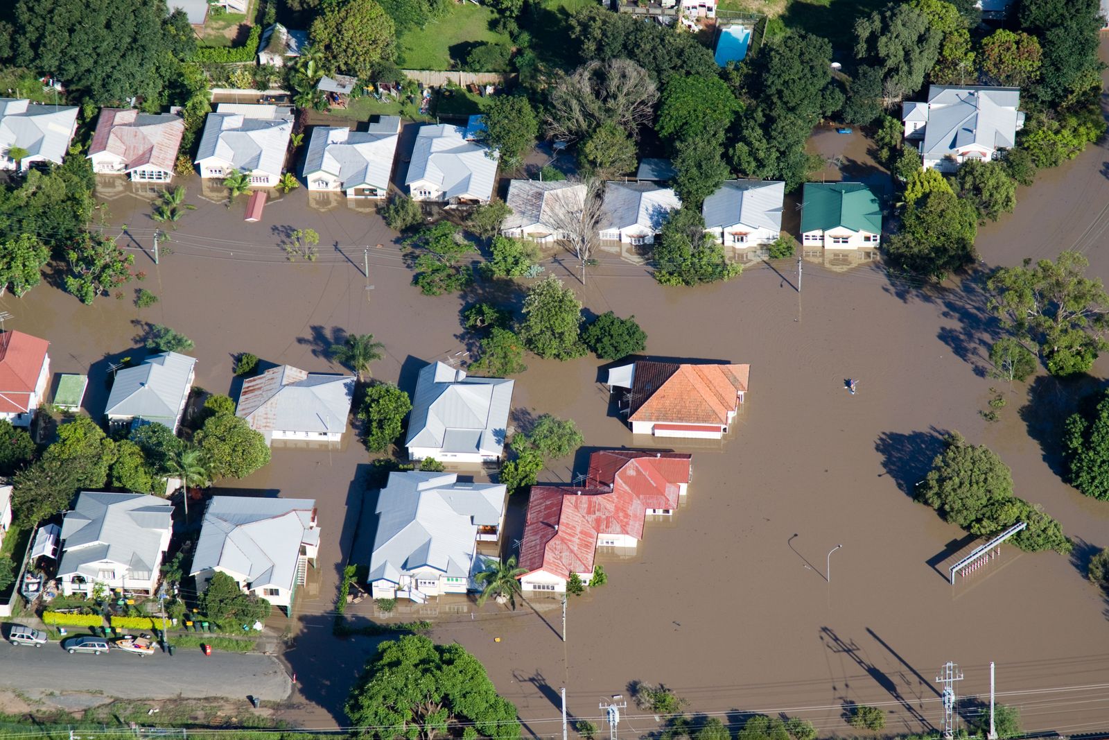 areal image of a suburb that has been flooded