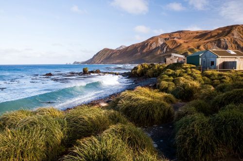 Editorial image showing a single hut sitting along a coast line from an undisclosed location.