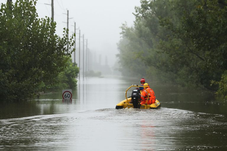 SYDNEY, AUSTRALIA - MARCH 23: State Emergency Service workers drive their rescue craft through the flooded Hawkesbury river along Inalls lane in Richmond on March 23, 2021 in Sydney, Australia. Evacuation warnings are in place for parts of Western Sydney.