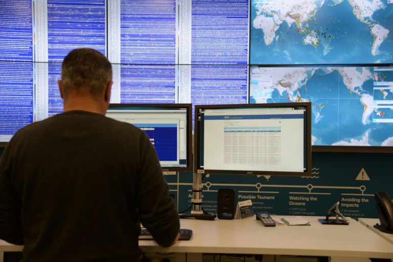 Scientist monitors screens in the National Earthquake Alert Centre.