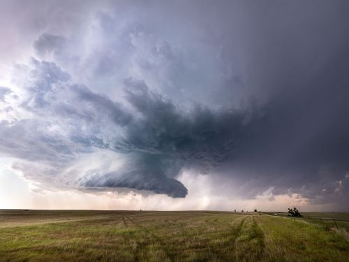 Storm clouds over a farm
