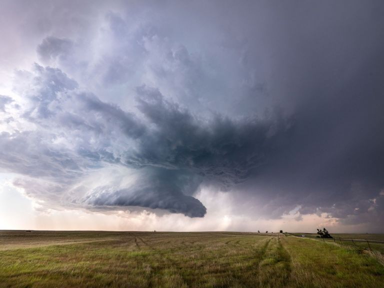 Storm clouds over a farm