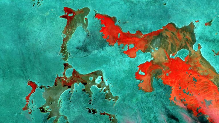 Abstract satellite image with red and blue highlights