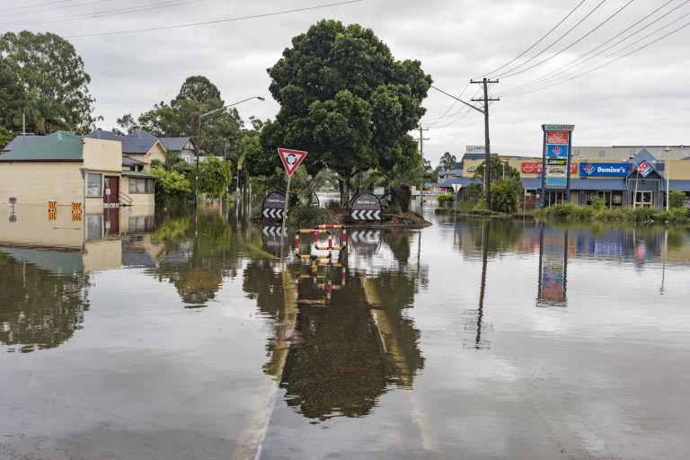 flooded town landscape with submerged roundabout