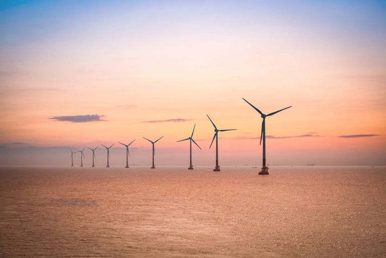 Offshore wind farm at dusk in the east China sea.