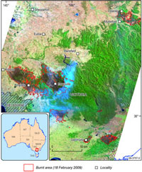 Fig 2a. Cloud-free image highlighting burnt areas (in red) and showing smoke rising from the Kinglake and Marysville fires.