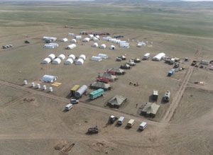 Fig 1. Aerial view of the IFE08 Base Camp with part of the former Soviet Union nuclear test site near Semipalatinsk, Kazakhstan, in the background.