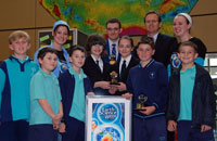Figure 1. Winners of the 2009 Geologi Short Film Competition with Dr James Johnson, Chief of Geoscience Australia's Onshore Energy and Minerals Division, following the presentation of awards.  
