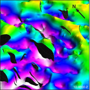 Figure 2. 3D geological model of the basement surface beneath the Capel and Faust basins, showing the compartmentalised, fault-bounded depocentres. The areas shown in violet to white colours indicate the depocentres while areas in yellow to green colours show the surrounding structural highs. The depocentres in the middle section are approximately 120 kilometres long.