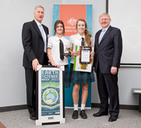 Fig 3. Bryden Sloan-Harris and Samantha Bayly, representing St Joseph's Regional College at Port Macquarie, received the Junior Division Geologi Award from the Minister for Resources, Energy and Tourism, the Hon Martin Ferguson AM MP (right), and Dr Chris Pigram, CEO of Geoscience Australia on 11 October.
